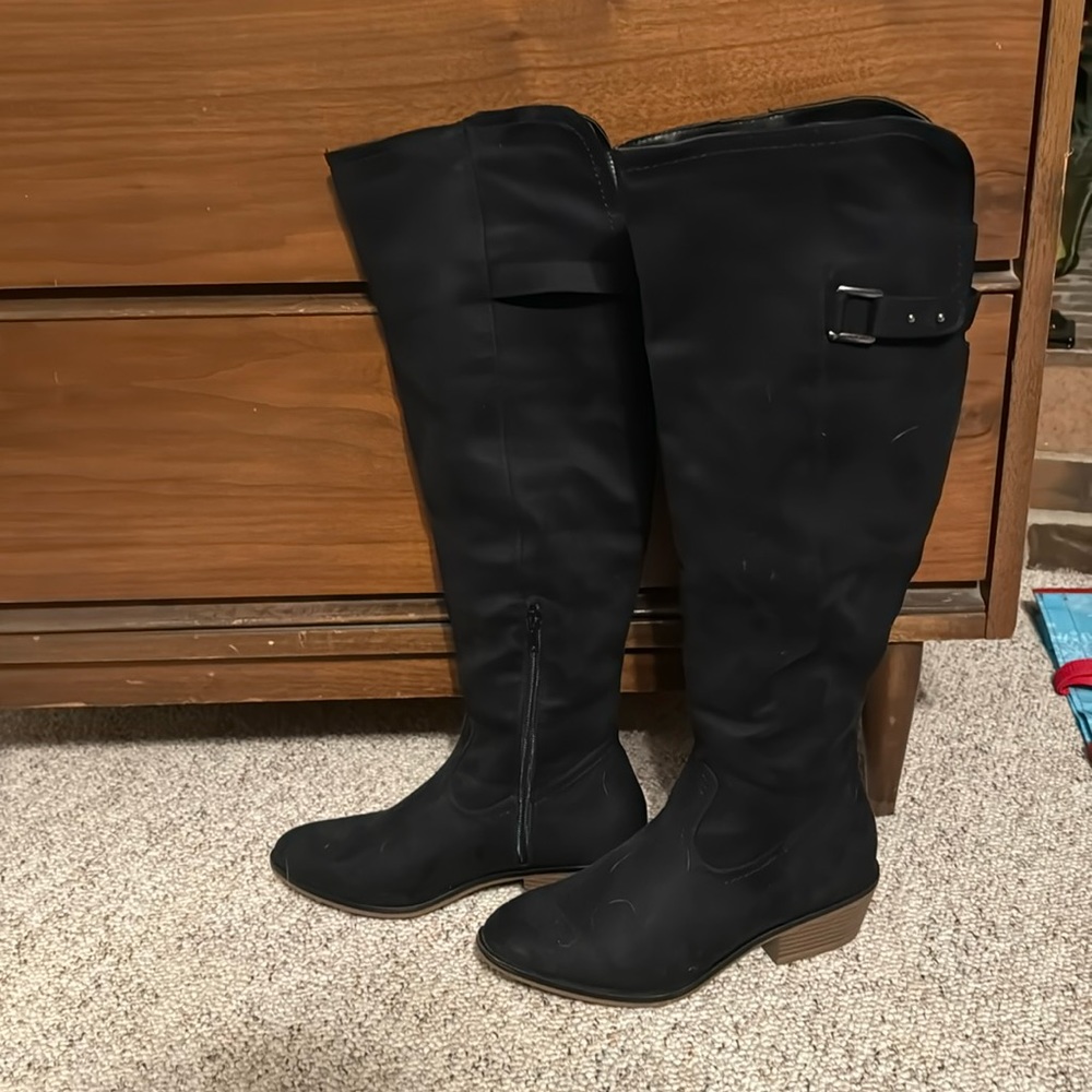 Maurice’s tall black boots